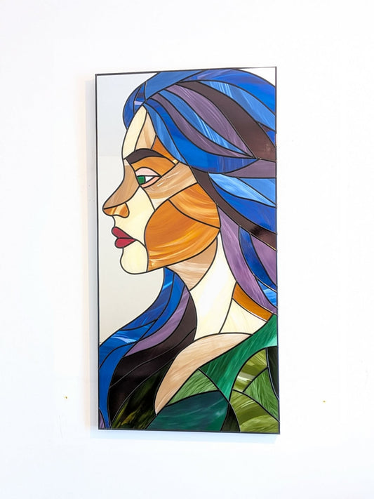 Modern stained glass style wall art featuring a colourful abstract portrait of a woman in profile. This vertical framed artwork showcases bold geometric shapes in rich blue, purple, green, and warm amber tones, with striking red lips and a green eye. The contemporary cubist-inspired design adds elegance and sophistication to living rooms, bedrooms, offices, or gallery walls. A vibrant statement piece perfect for modern home décor, art collectors, and unique gift ideas.