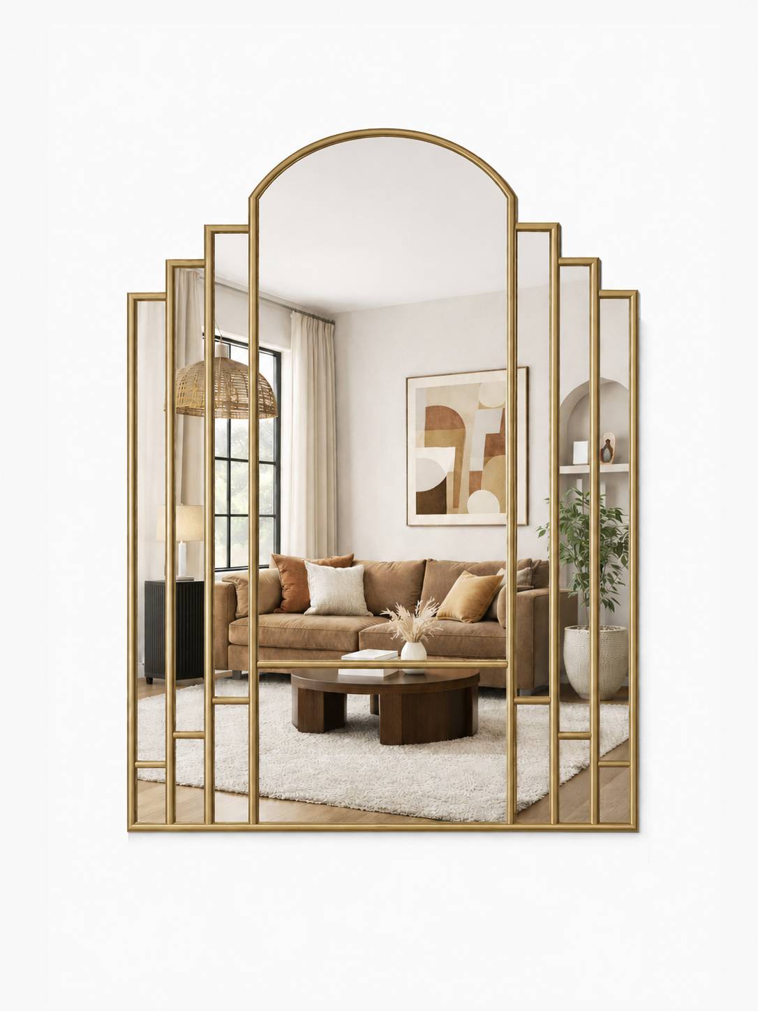 Decorative wall mirror with gold frame in a living room setting