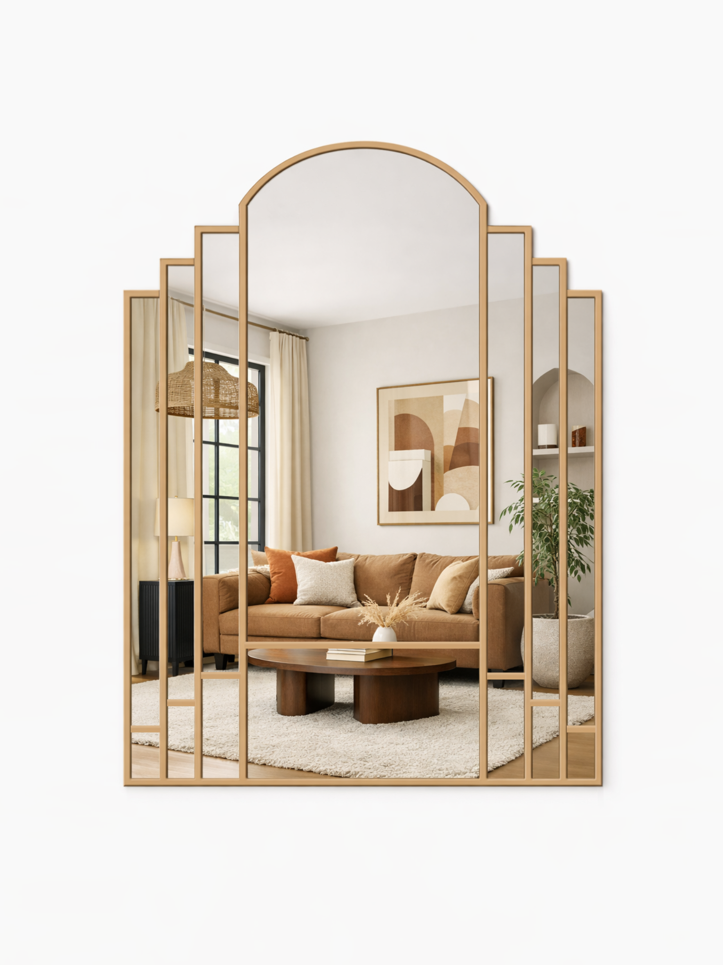 Decorative wall mirror with gold frame in a living room setting