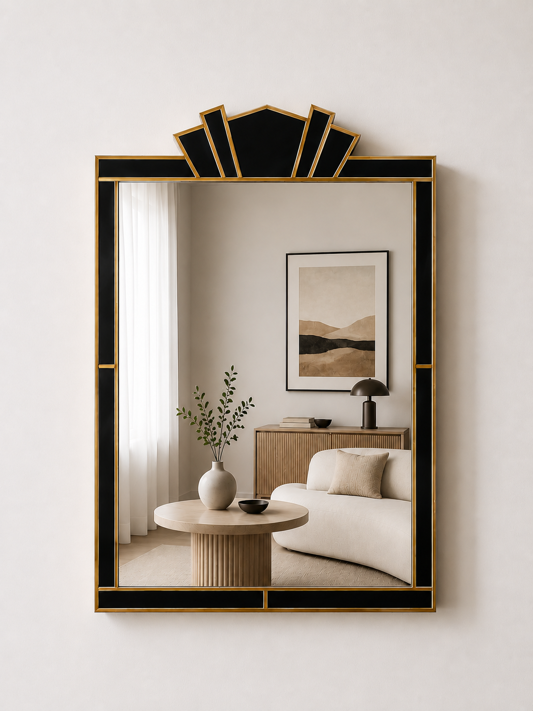 Decorative mirror with a black and gold frame in a room with a sofa and coffee table.
