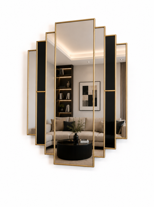 A modern multi-panel wall mirror with a gold frame and alternating black and reflective mirror panels, shown mounted on a white wall with a reflection of a living room visible.