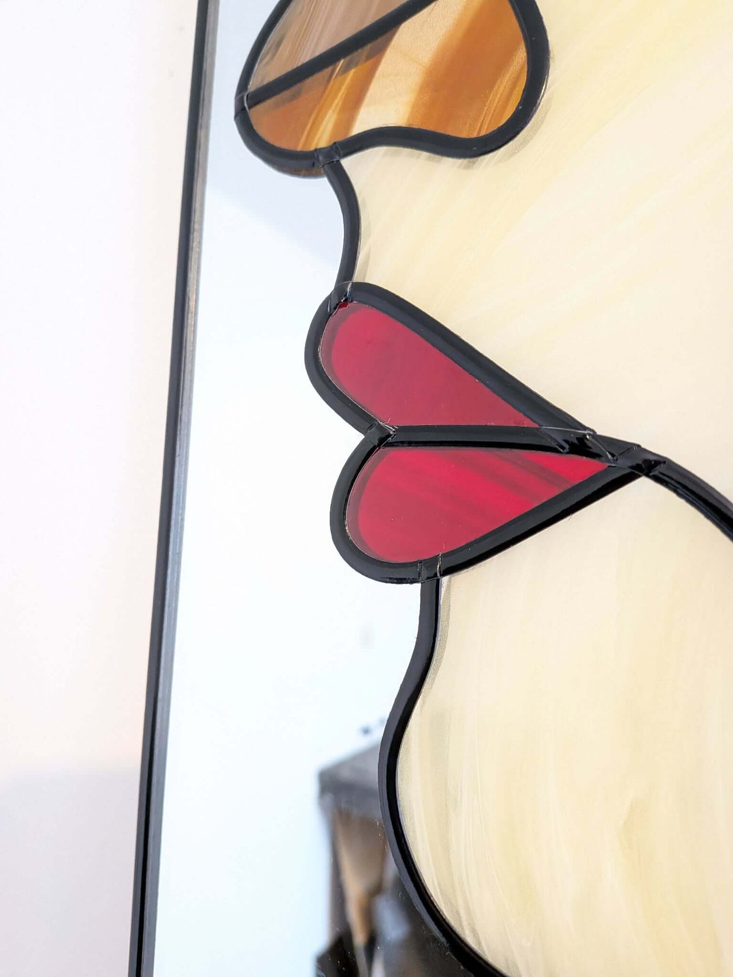 Modern stained glass style wall art featuring a colourful abstract portrait of a woman in profile. This vertical framed artwork showcases bold geometric shapes in rich blue, purple, green, and warm amber tones, with striking red lips and a green eye. The contemporary cubist-inspired design adds elegance and sophistication to living rooms, bedrooms, offices, or gallery walls. A vibrant statement piece perfect for modern home décor, art collectors, and unique gift ideas.