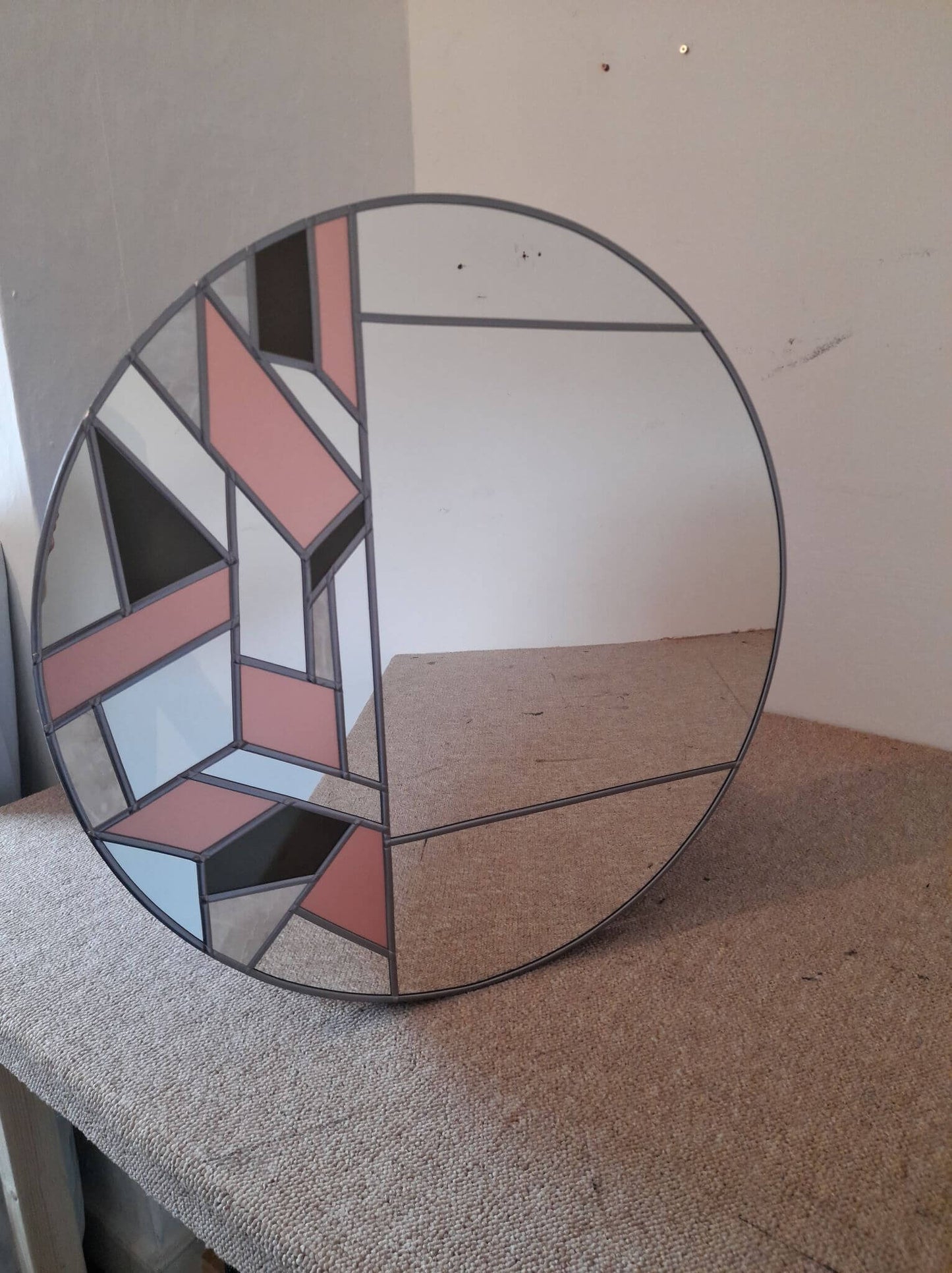 round geometric mirror