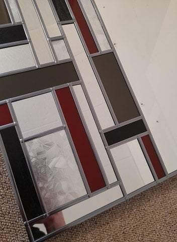Large silver wall hanging mirror